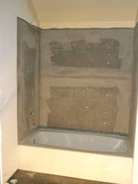 Wonder board around bathtub in basement bathroom